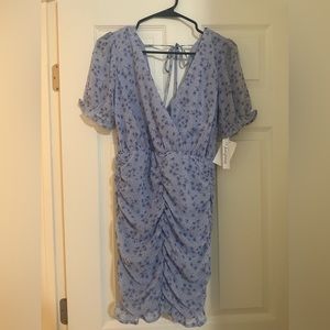 Xtraordinary floral dress. New with tags. Size XS